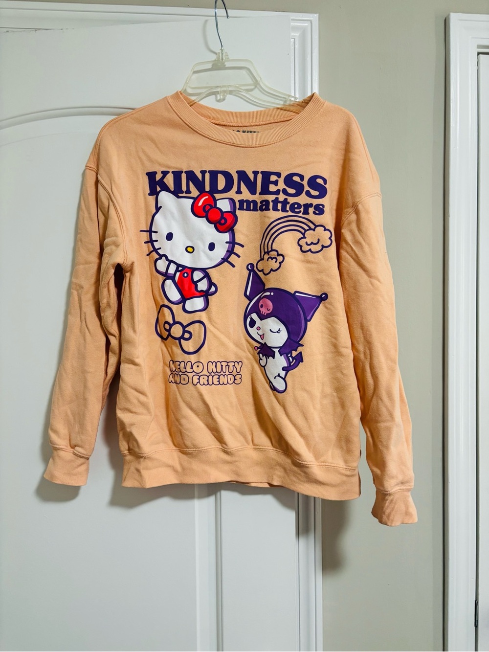 HELLO KITTY SANRIO, "Kindness Matters" Peach Crewneck Sweatshirt, Size Medium